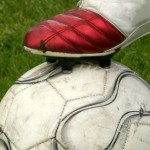 Image of a football and boot